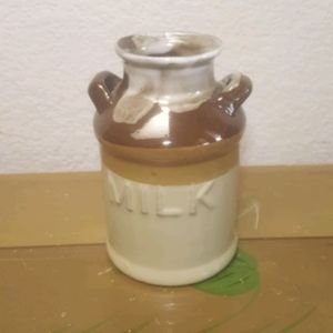 Terracotta  with enamel "milk" jug